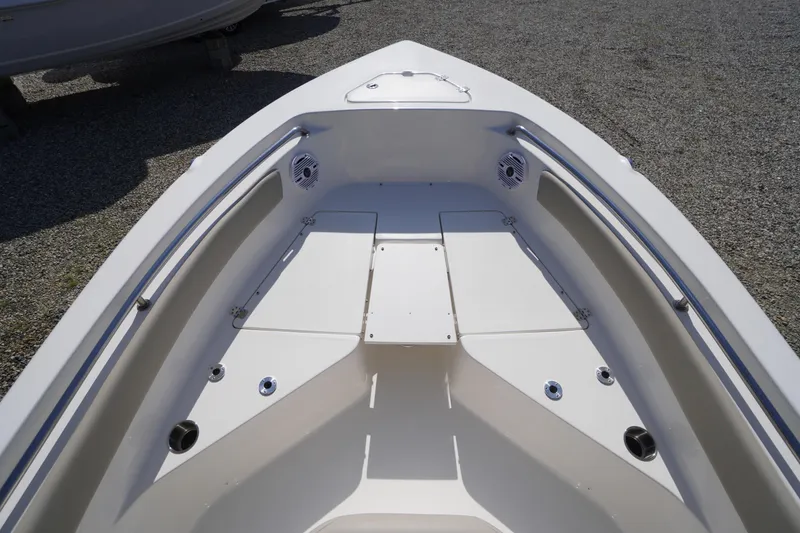 Slide: The Image of 2025 Key West 203 FS boat interior with seating and storage compartments. - 27
