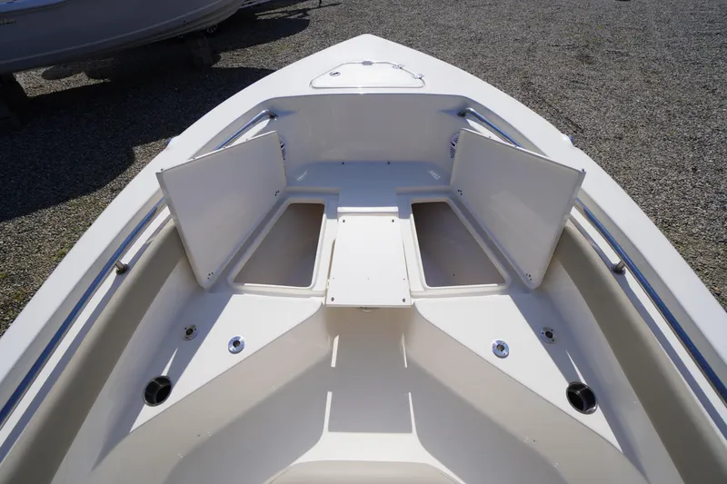 Slide: The Image of 2025 Key West 203 FS boat interior with open storage compartments. - 28