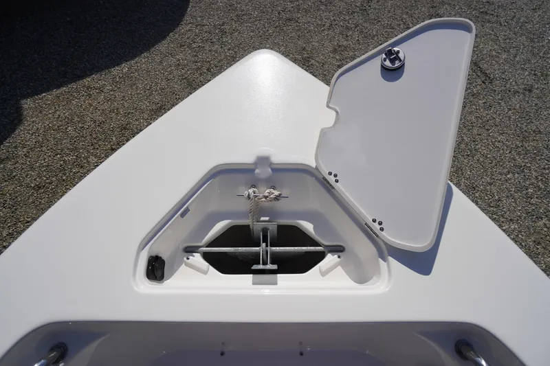 Slide: The Image of 2025 Key West 203 FS boat anchor compartment with open hatch. - 33