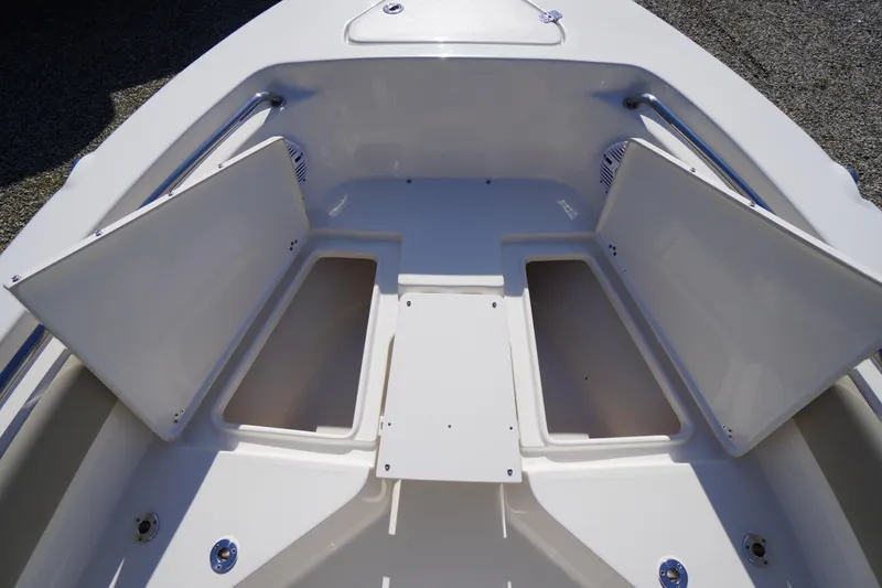 Slide: The Image of 2025 Key West 203 FS boat storage compartments open, showcasing spacious design. - 34
