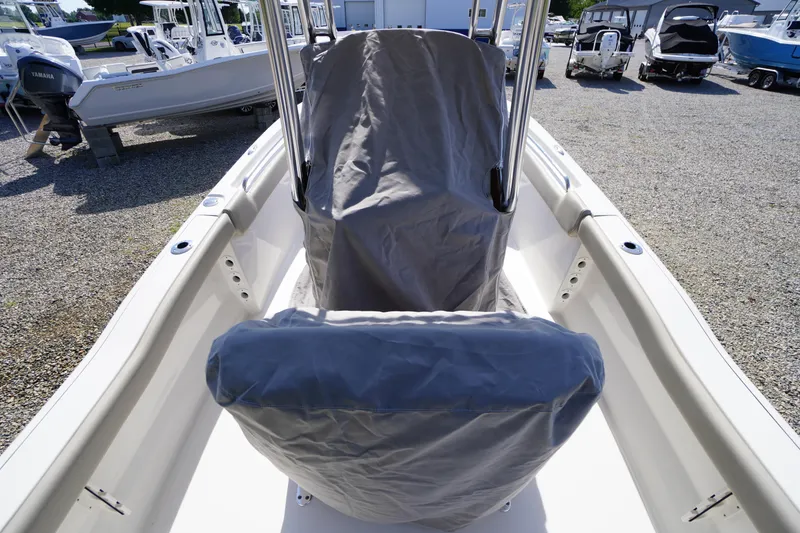 Slide: The Image of 2025 Key West 203 FS boat interior with covered console and seat. - 7