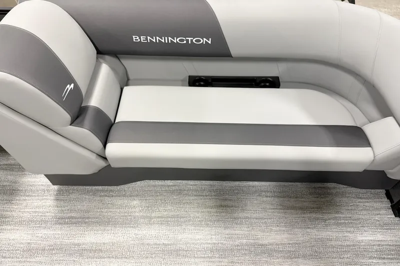Slide: The Image of 2026 Bennington 22 S Quad Bench, gray and white seating on a carpeted floor. - 10