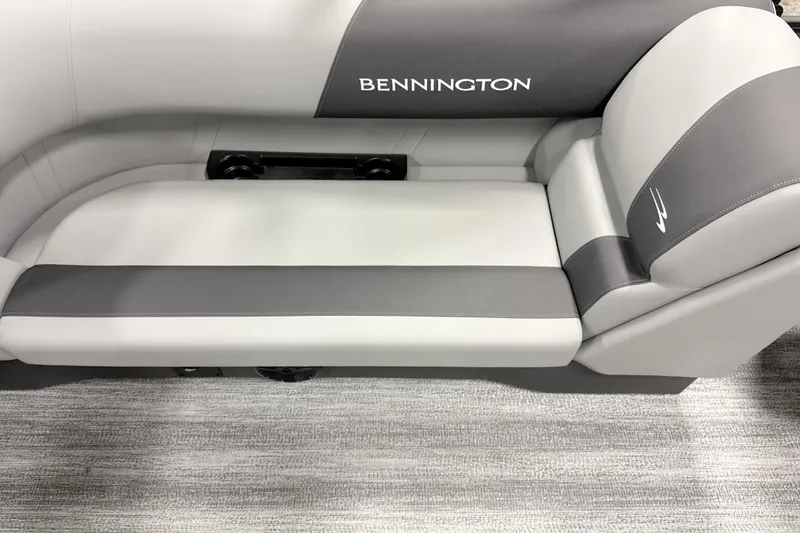 Slide: The Image of 2026 Bennington 22 S Quad Bench boat seat, gray and white upholstery. - 11