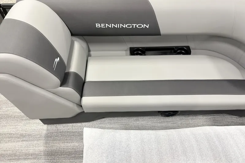Slide: The Image of 2026 Bennington 22 S Quad Bench boat seat, gray and white upholstery, elegant design. - 8