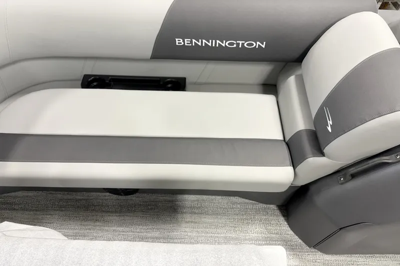 Slide: The Image of 2026 Bennington 22 S Quad Bench, gray and white seating detail. - 9
