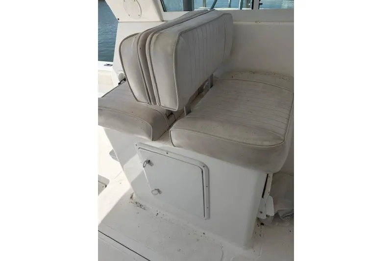 Slide: The Image of 2006 Baha Cruisers 300 GLE boat seating with storage compartment. - 15