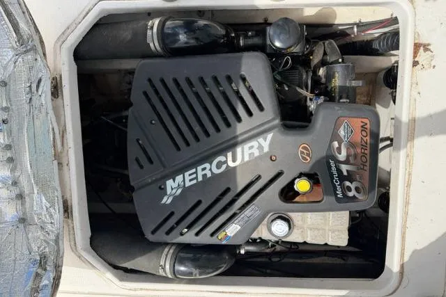 Slide: The Image of Engine compartment of a 2006 Baha Cruisers 300 GLE with Mercury MerCruiser 8.1S Horizon engine. - 18