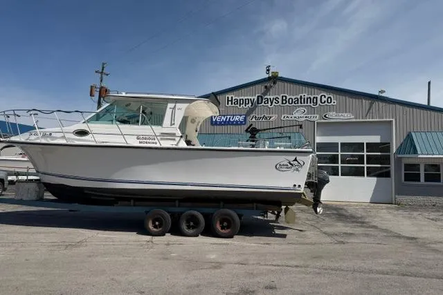 Slide: The Image of 2006 Baha Cruisers 300 GLE boat on trailer at Happy Days Boating Co. - 2