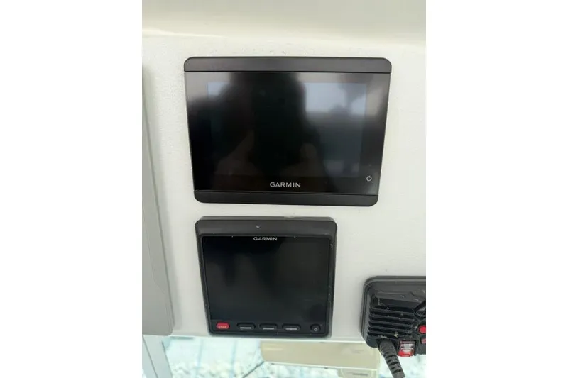 Slide: The Image of Garmin navigation screens on 2006 Baha Cruisers 300 GLE boat dashboard. - 8