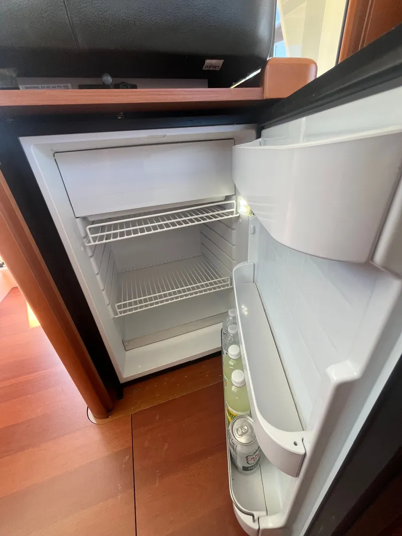 Slide: The Image of Refrigerator in Beneteau Swift Trawler 34 Fly, 2015 model. - 12