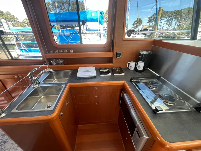 Slide: The Image of Interior of 2015 Beneteau Swift Trawler 34 Fly kitchen. - 11