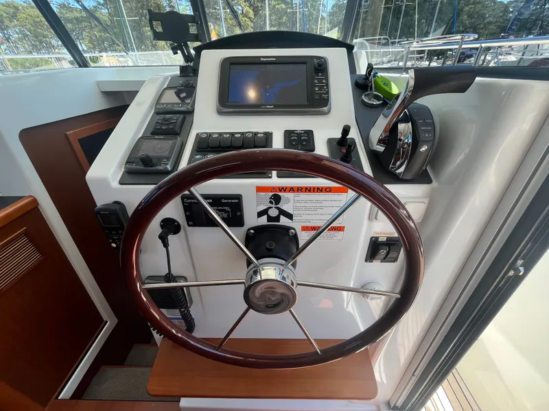 Slide: The Image of Helm station of Beneteau Swift Trawler 34 Fly, 2015 model. - 15