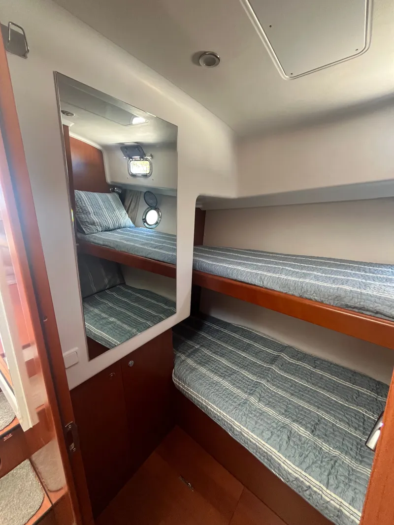Slide: The Image of Interior of 2015 Beneteau Swift Trawler 34 Fly with bunk beds. - 20