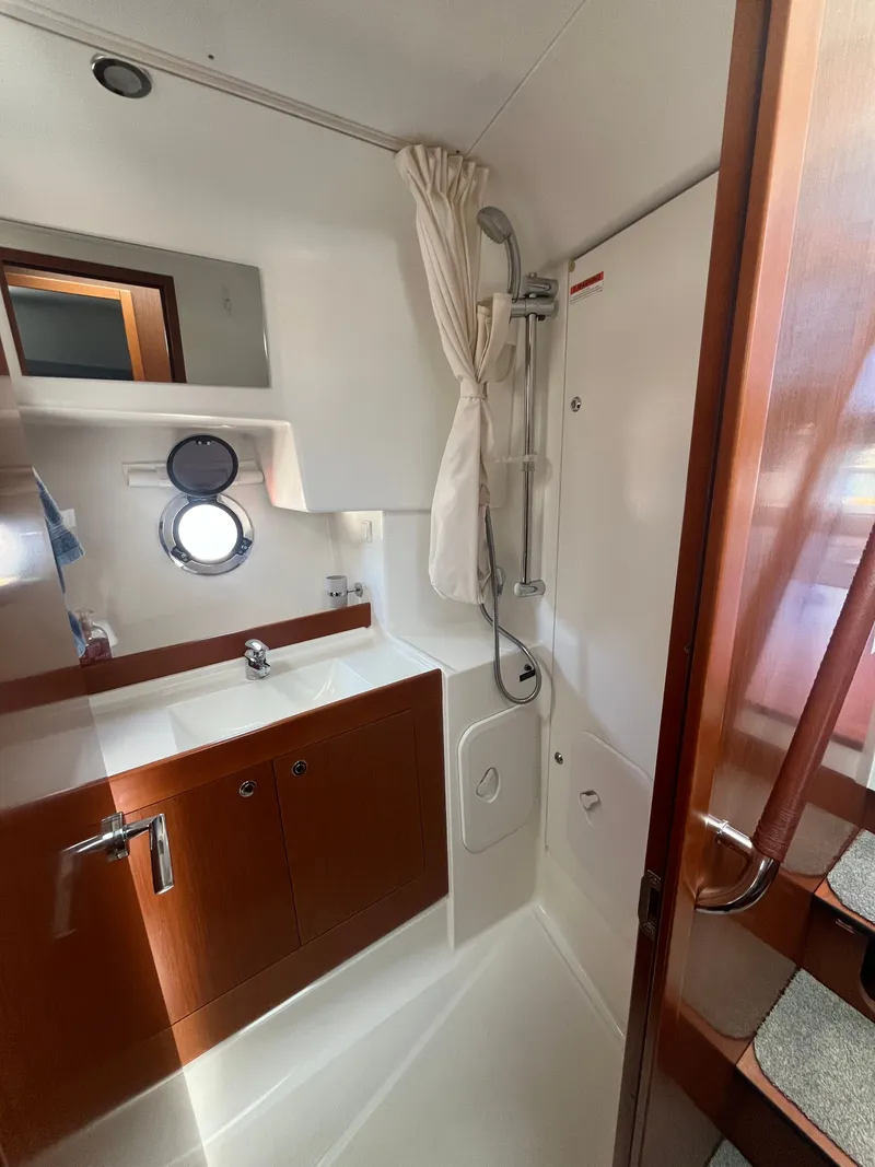 Slide: The Image of Interior view of 2015 Beneteau Swift Trawler 34 Fly bathroom. - 23