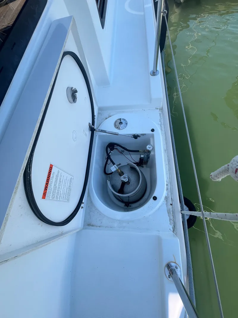 Slide: The Image of Beneteau Swift Trawler 34 Fly 2015, open deck compartment with equipment. - 39