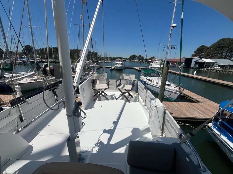 Slide: The Image of Beneteau Swift Trawler 34 Fly 2015 in marina, sunny day. - 45