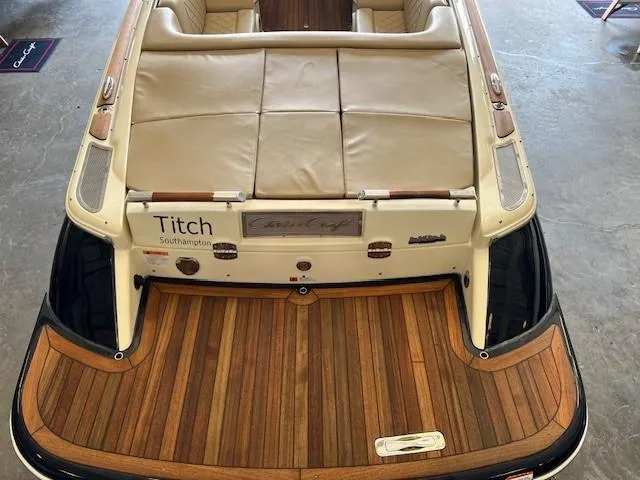 Slide: The Image of 2014 Chris-Craft Corsair 25 with teak deck and beige upholstery. - 18