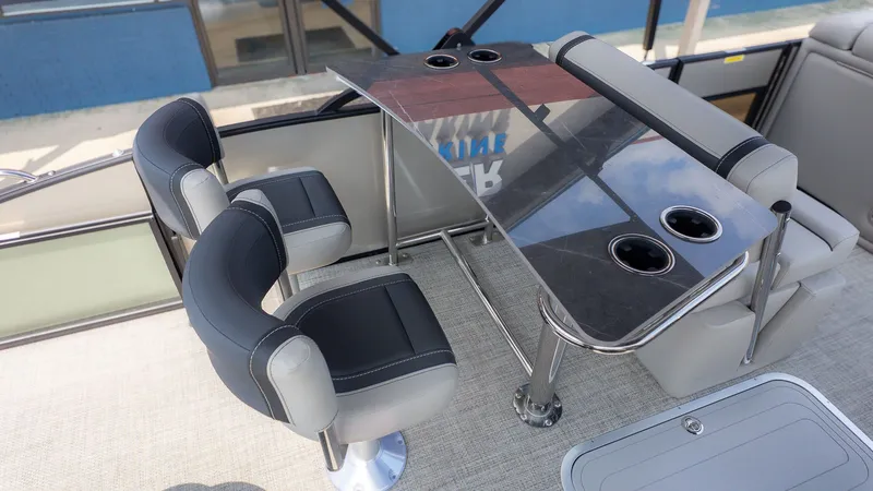 Slide: The Image of Interior of 2026 Barletta Cabrio 24UE with sleek seating and table. - 10