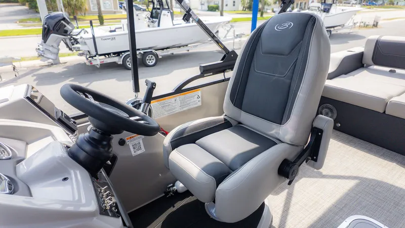 Slide: The Image of Interior of 2026 Barletta Cabrio 24UE with helm seat. - 21