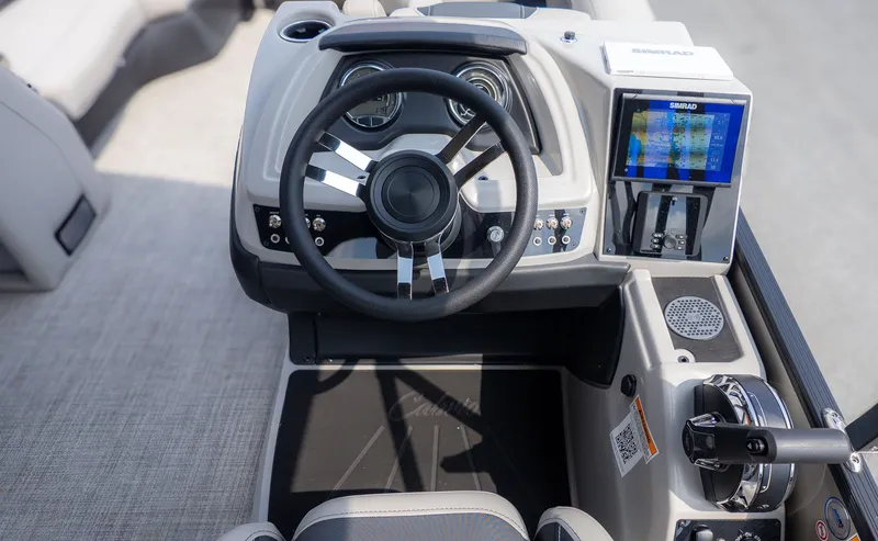 Slide: The Image of 2026 Barletta Cabrio 24UE helm with Simrad display. - 23