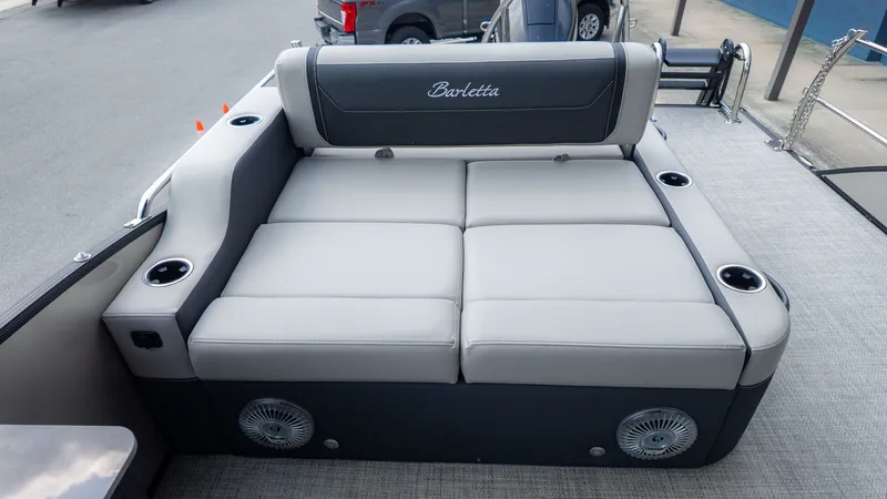 Slide: The Image of Barletta Cabrio 24UE 2026 boat seating with cup holders. - 9