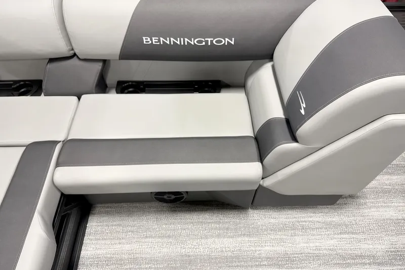 Slide: The Image of 2026 Bennington 22 S Swingback boat seating in gray and white upholstery. - 10