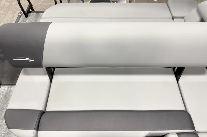Slide: The Image of 2026 Bennington 22 S Swingback boat seat, featuring sleek gray and white upholstery. - 11