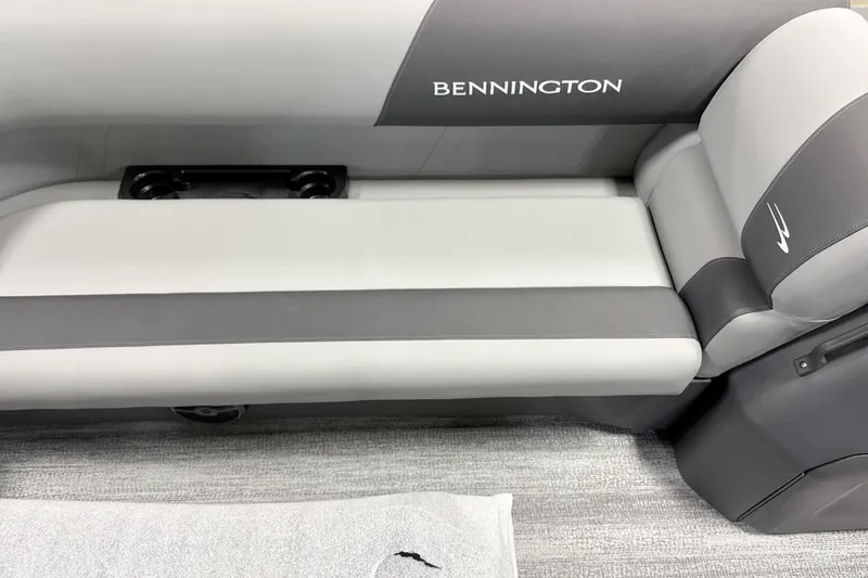 Slide: The Image of 2026 Bennington 22 S Swingback boat seat with gray and white upholstery. - 9