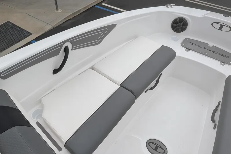 Slide: The Image of Interior of 2026 Tahoe T21 boat with cushioned seating and sleek design. - 13