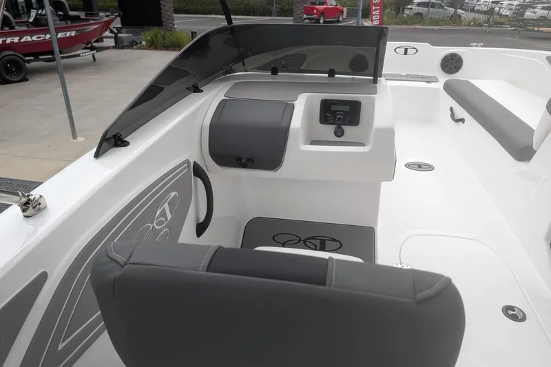 Slide: The Image of 2026 Tahoe T21 boat interior with sleek dashboard and seating. - 14