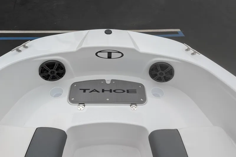 Slide: The Image of 2026 Tahoe T21 boat interior with speakers and branded panel. - 12