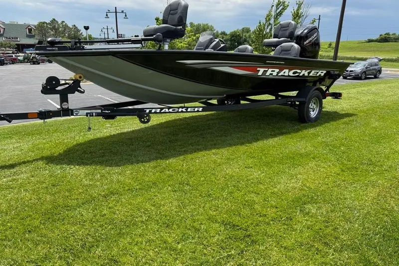 Slide: The Image of 2026 Tracker Pro Team 175 Crappie Edition boat on trailer, parked on grass. - 5