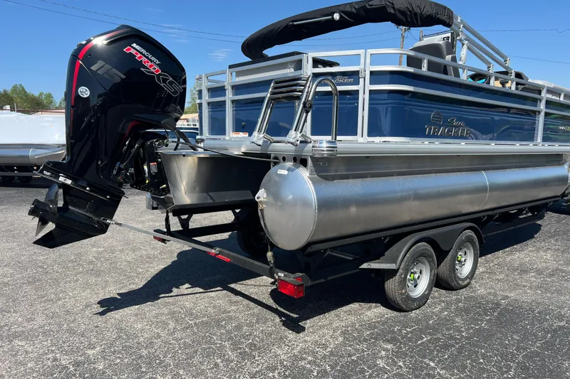 Slide: The Image of 2026 Sun Tracker SportFish 20 DLX pontoon boat with Mercury Pro XS engine on trailer. - 3