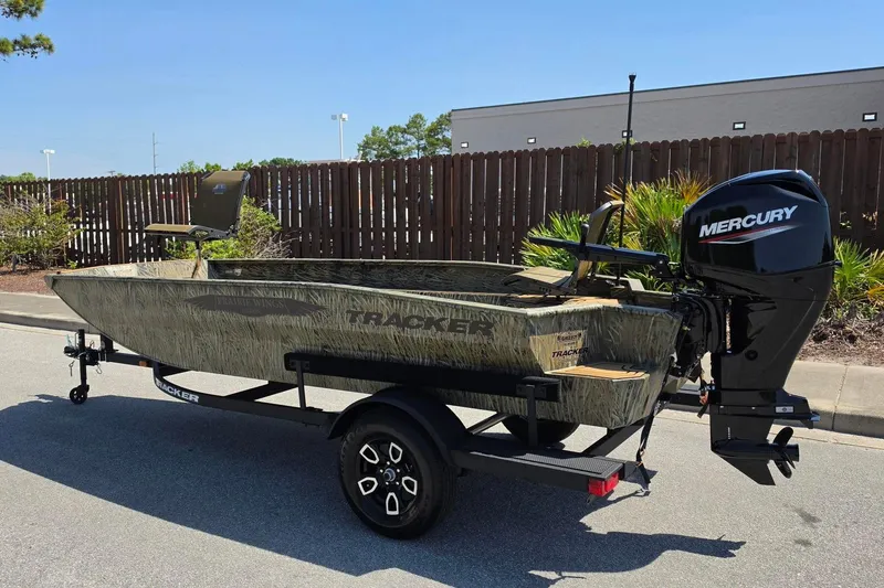 Slide: The Image of 2026 Tracker Grizzly 1650 T Prairie Wings Edition boat with Mercury outboard motor. - 7