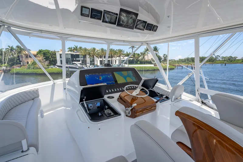 Slide: The Image of Luxurious helm of 2026 Viking 54 Convertible yacht with advanced navigation systems. - 66