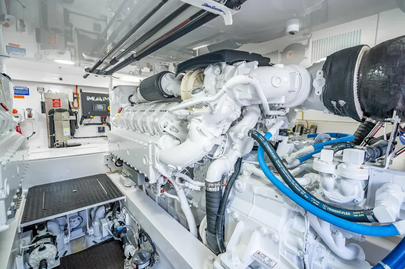 Slide: The Image of Engine room of 2026 Viking 54 Convertible yacht, showcasing advanced machinery and components. - 74