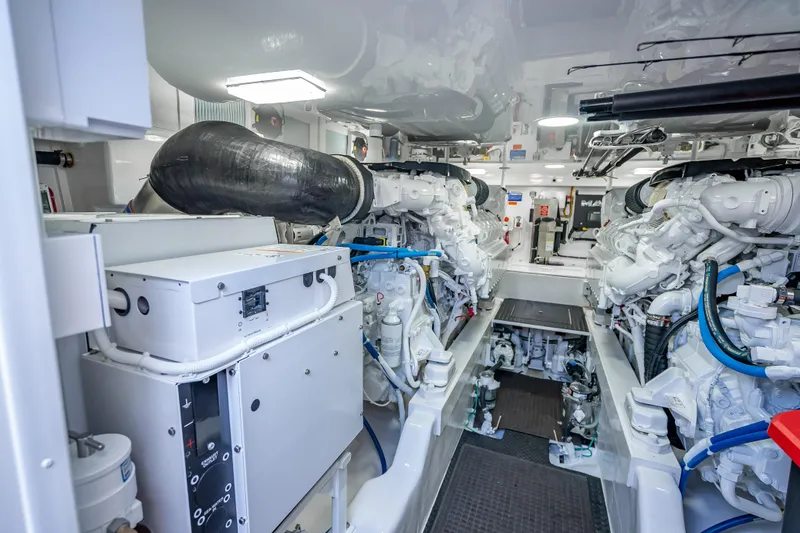 Slide: The Image of Engine room of 2026 Viking 54 Convertible yacht, showcasing advanced machinery and equipment. - 77