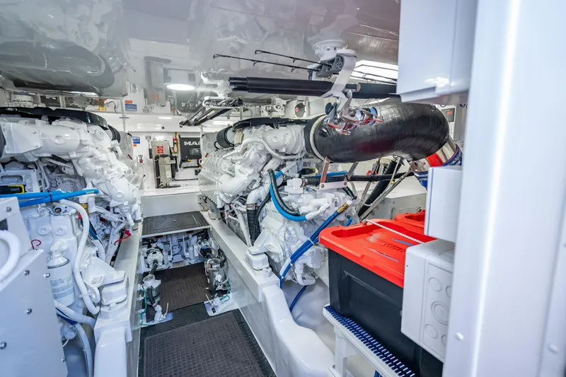 Slide: The Image of Engine room of 2026 Viking 54 Convertible yacht, showcasing advanced machinery and equipment. - 79