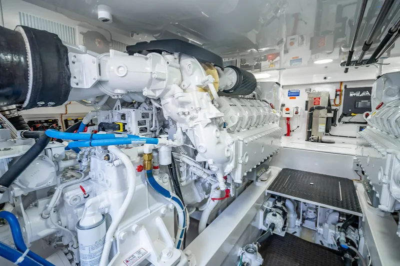 Slide: The Image of Engine room of 2026 Viking 54 Convertible yacht, showcasing advanced machinery and components. - 84