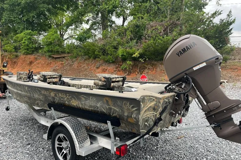 Slide: The Image of 2026 War Eagle 754VS Stick Steer boat with Yamaha motor on a trailer. - 5