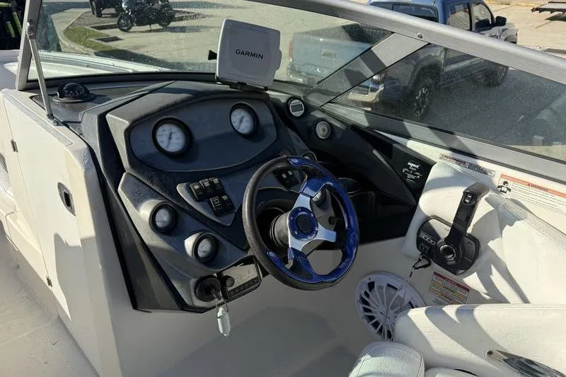 Slide: The Image of Cockpit of 2010 Monterey M5 Sport Boat with Garmin navigation system and modern controls. - 18