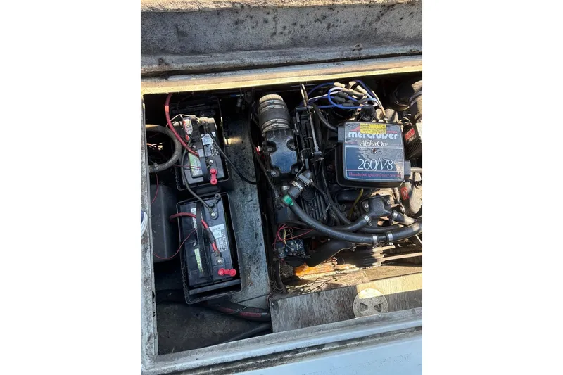Slide: The Image of Engine compartment of 1987 Four Winns 245 Vista with MerCruiser Alpha One 260 V8 engine. - 10