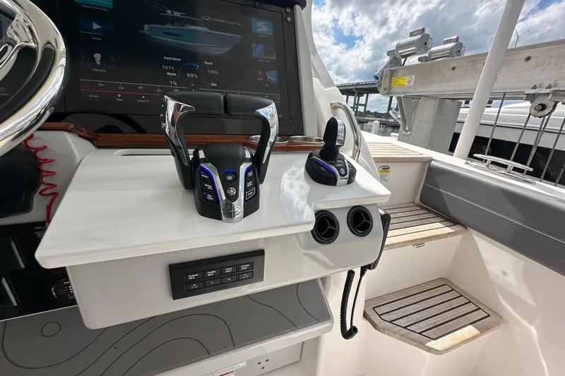Slide: The Image of Control panel of 2025 Regal 38 SAV boat with advanced navigation system. - 14