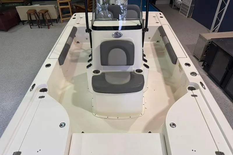 Slide: The Image of 2023 Sea Born FX22 Bay boat interior with seating and console. - 16