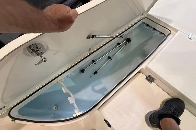 Slide: The Image of Open storage compartment on 2023 Sea Born FX22 Bay boat deck. - 21