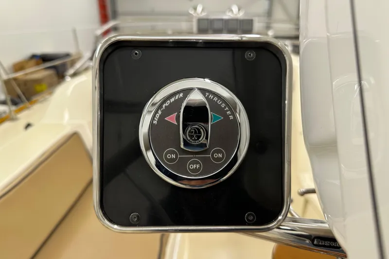 Slide: The Image of Side-Power thruster control panel on 2007 Sabre 386 yacht, featuring on/off buttons. - 102