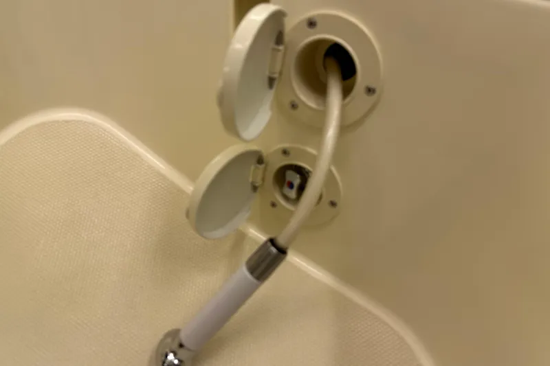 Slide: The Image of Boat shower hose and outlet on a 2007 Sabre 386 yacht. - 104