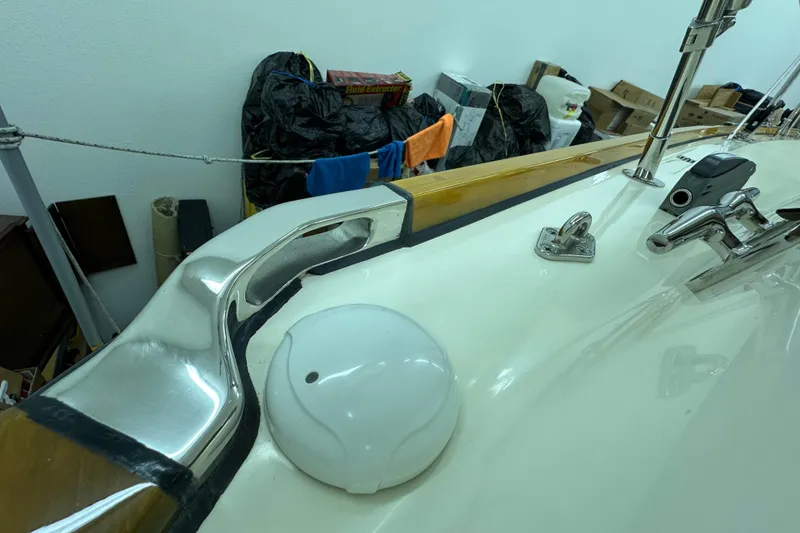Slide: The Image of 2007 Sabre 386 yacht deck with stainless steel fittings and equipment. - 105