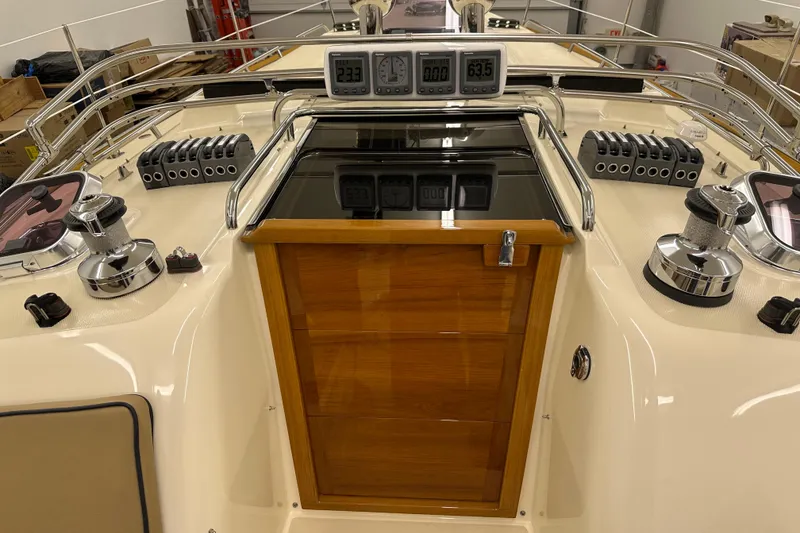 Slide: The Image of 2007 Sabre 386 yacht cockpit with navigation instruments and polished winches. - 112