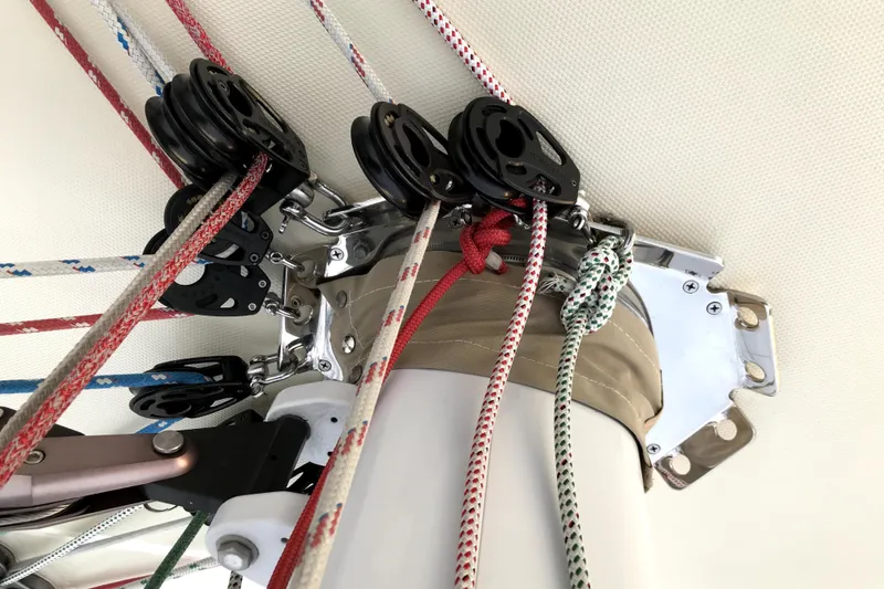 Slide: The Image of Sailing rigging system on a 2007 Sabre 386 yacht, featuring ropes and pulleys. - 139